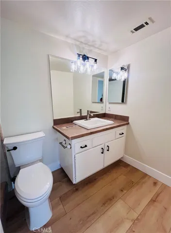 Primary bath with new medicine chest, hardware and lighting