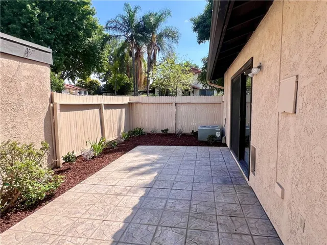 Patio has key locked sliding door to home.