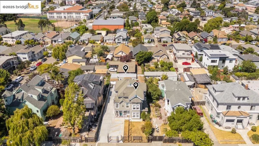 Aerial overview of property's location with nearby suburban area