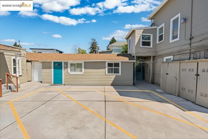 Rear view of property featuring a patio