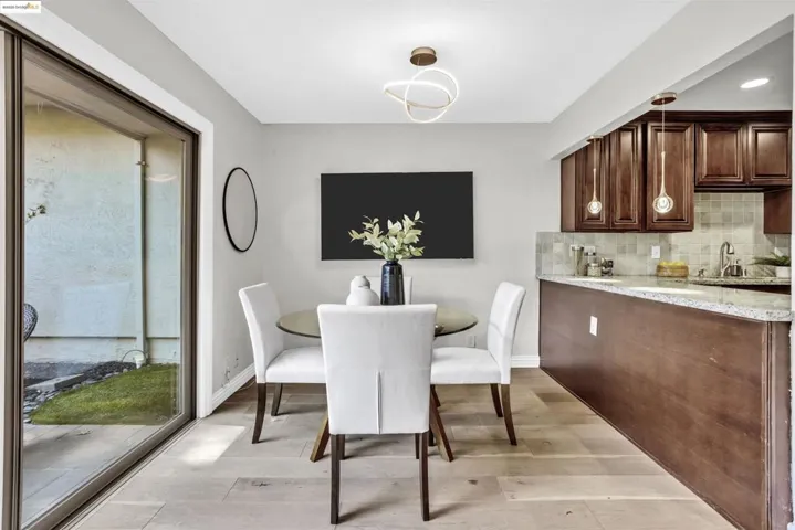Dining space featuring light wood-style floors