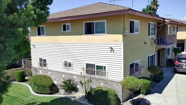 Front of property and main driveway entrance.
