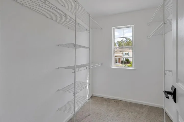 One of two walk-in closets in Owner's suite