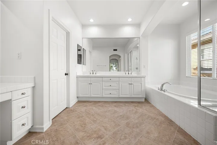 Ensuite with Dual Sink and Sunken Tub and Separate Walk-in Shower