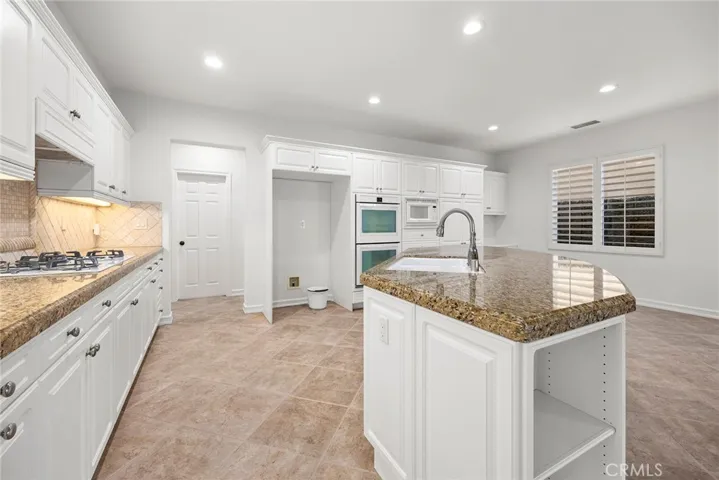Beautiful White Cabinets and Granite Counter Tops