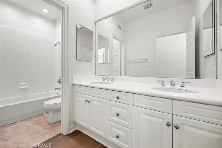 Upstairs Hall Bathroom with Dual Sinks and Separate Tub/Shower Room