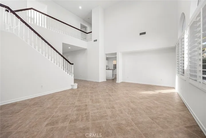 High Ceilings and Beautiful Wood Flooring