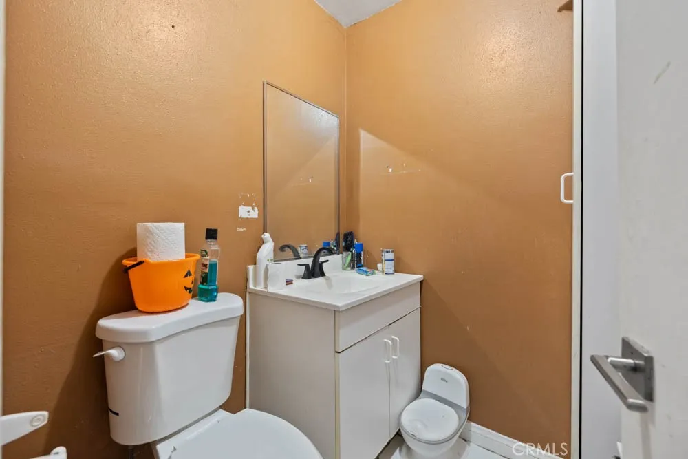 Bathroom in back office space.