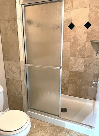 Private enclosed custom shower area.
