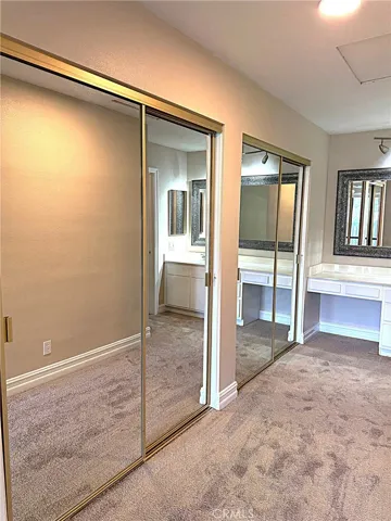 Primary bath area with lots of closet space.