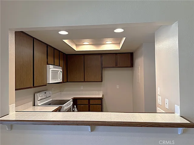 Kitchen with breakfast bar.