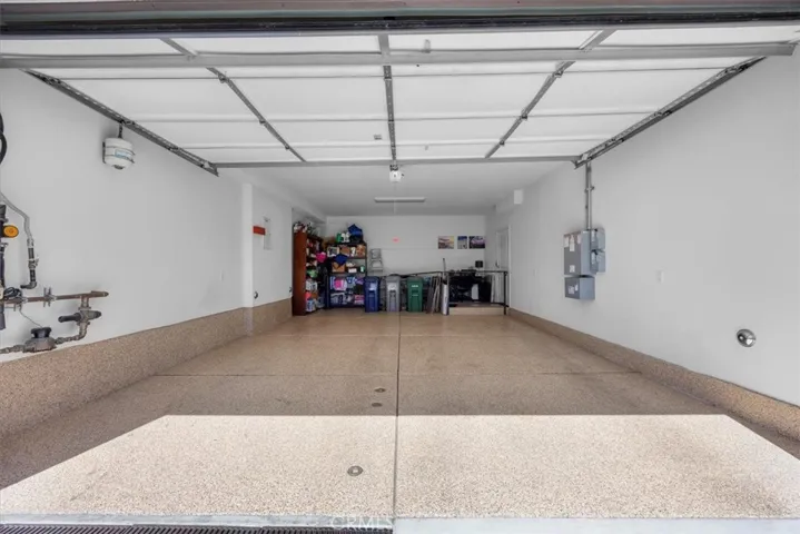 Spacious garage with epoxy floors