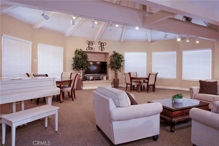 Meeting/card room with T.V. and piano.