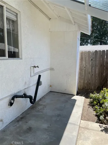 Outside full size hook ups for washer & dryer.