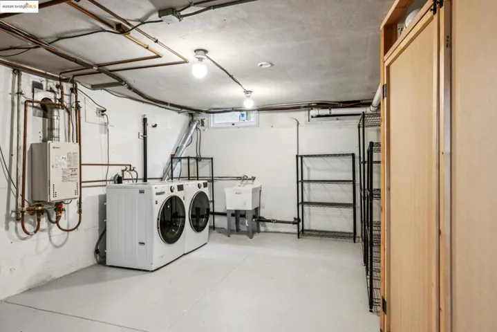 Basement with separate washer and dryer and water heater