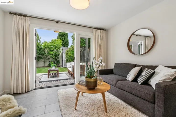 Living area featuring light tile patterned flooring
