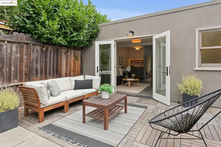 Wooden deck with an outdoor living space