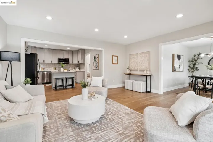 Living room featuring recessed lighting and light wood-type flooring