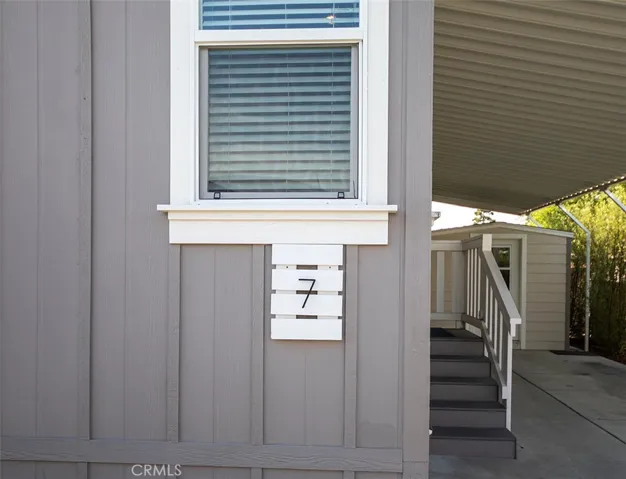 Address plate with front entry stairs