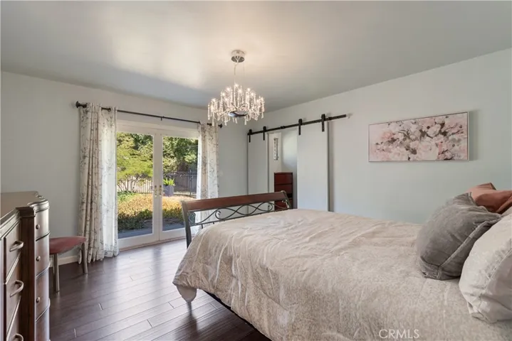 Primary Bedroom with Double Doors to Back Yard