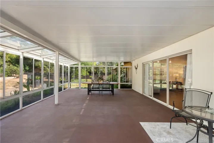 Sun Room Opens to the Side Yard