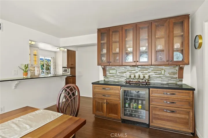 Gorgeous Built In Cabinets with Beverage Frig