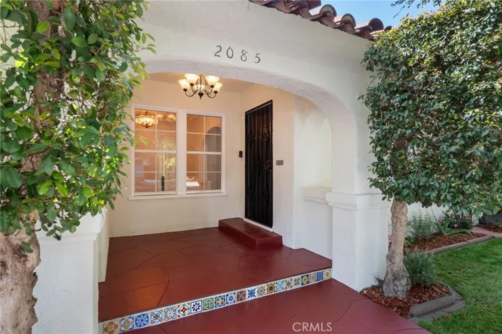 Front porch with Spanish tile inlay.