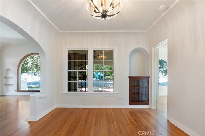 Dining room with lot ample natural light.