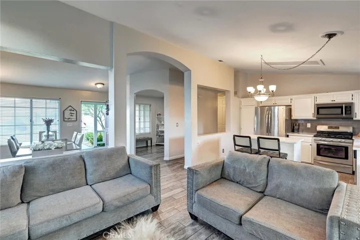 FAMILY ROOM LOOKING TO KITCHEN