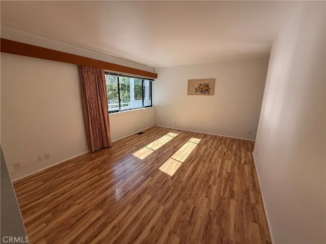  Master bedroom with door to the deck on the right side.