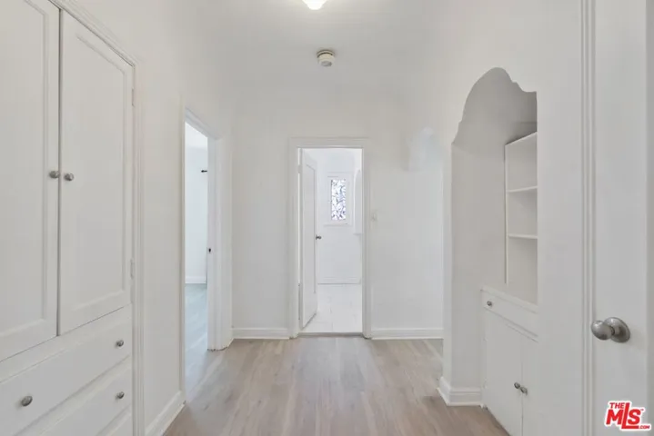 Hallway to Bedrooms w/ Linen,