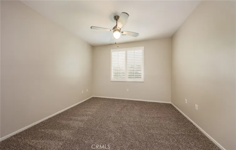 Den with Ceiling Fan, New Carpet, New Paint, Plantation Shutters