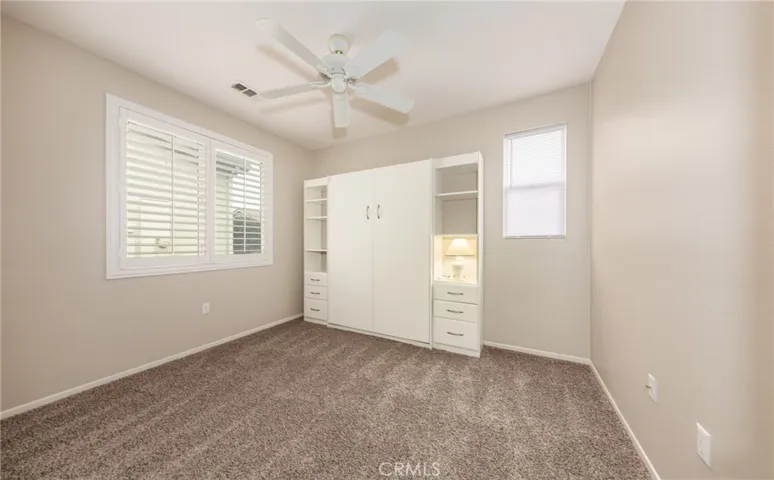 Guest Bedroom with Ceiling Fan, Murphy Bed included in Purchase, Plantation Shutters, New Carpet, New Paing