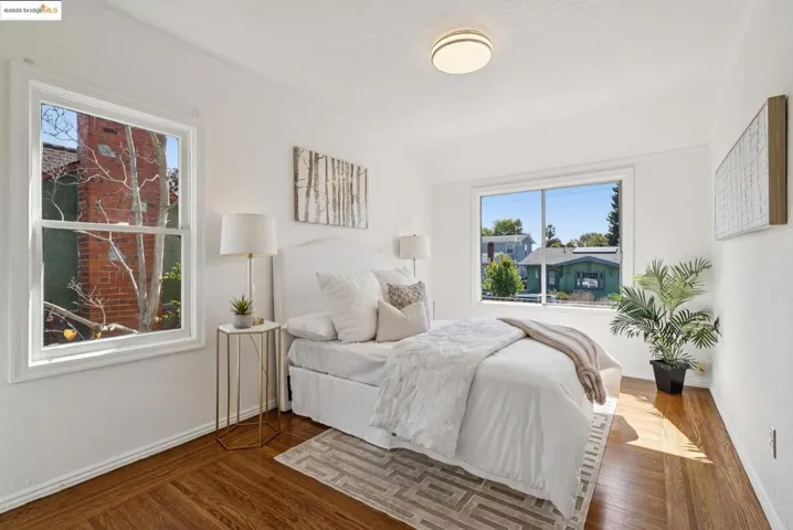 Bedroom with wood finished floors