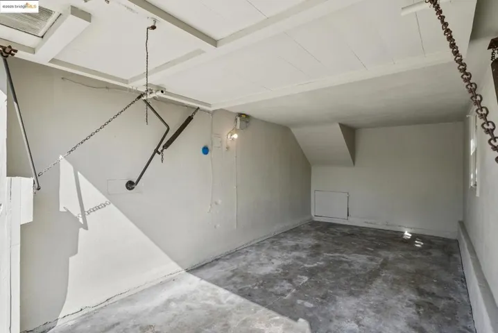 Additional living space with concrete flooring