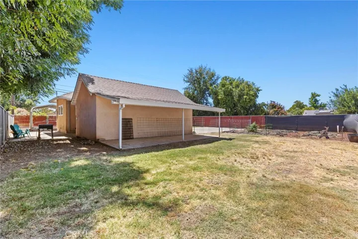 LOOKING FROM NE CORNER OF YARD