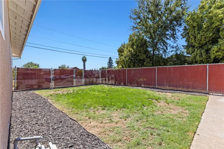 WEST SIDE OF HOME/YARD