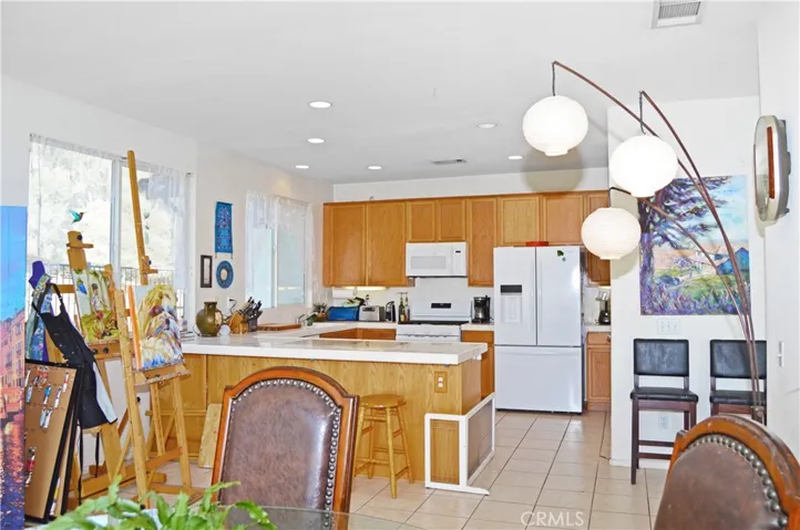 This Room Has a Fireplace and Is Open to the Kitchen with a Niche Open to More Living Space, So Can be a Family Room, Dining Space, Artist's Studio or Whatever You Desire
