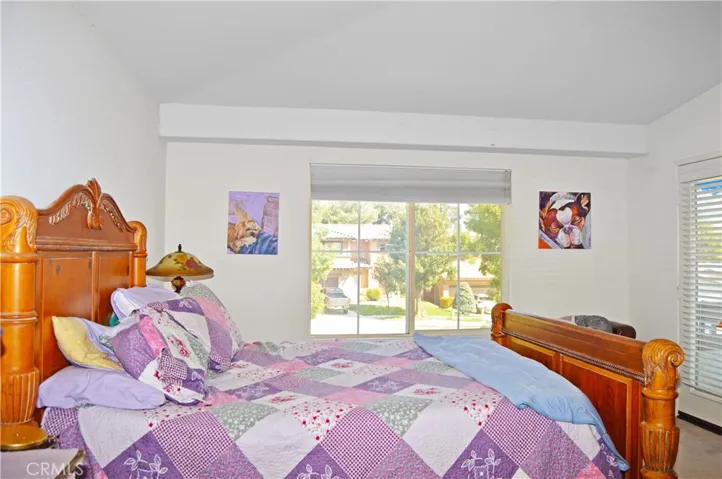 Spacious Main Bedroom Suite with Retreat Area, View Balcony, and an En Suite Bath