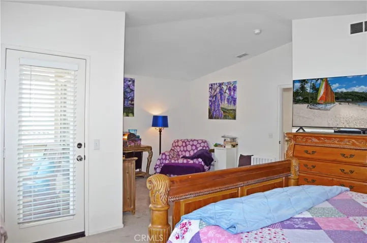 Spacious Main Bedroom Suite with Retreat Area, View Balcony, and an En Suite Bath