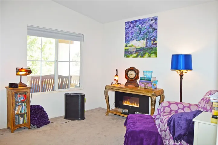 Spacious Main Bedroom Suite with Retreat Area, View Balcony, and an En Suite Bath