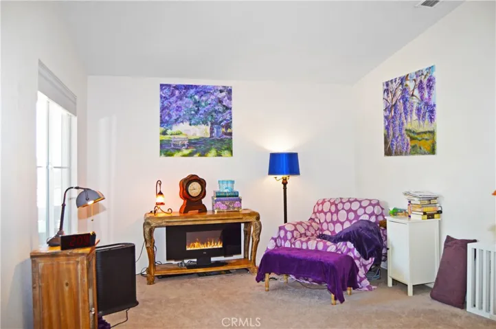 Spacious Main Bedroom Suite with Retreat Area, View Balcony, and an En Suite Bath