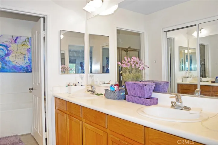 Dual Sinks and Privacy Door to Bathroom