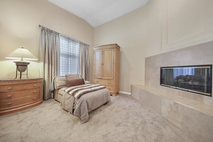 primary with fireplace & sitting area
