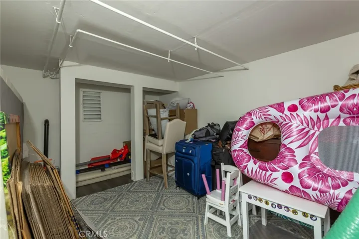 three car garage with storage room