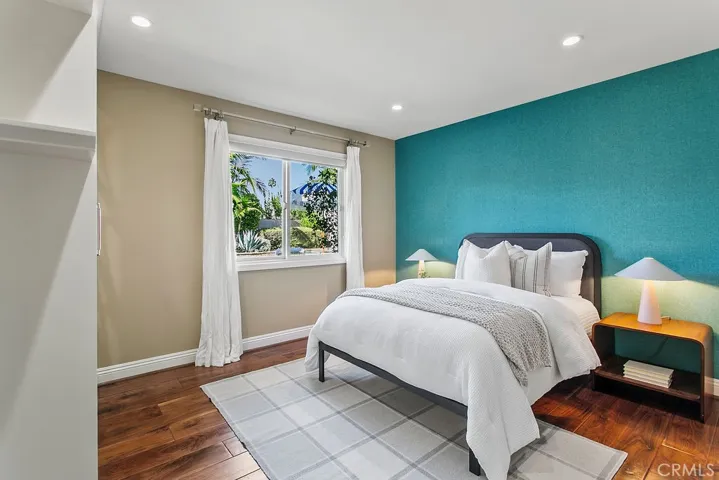 Bedroom #3 with views to pool courtyard.