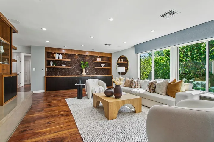 Living room with built-in cabinetry throughout.