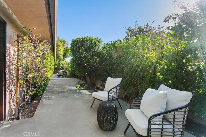 Seating area at rear of home.
