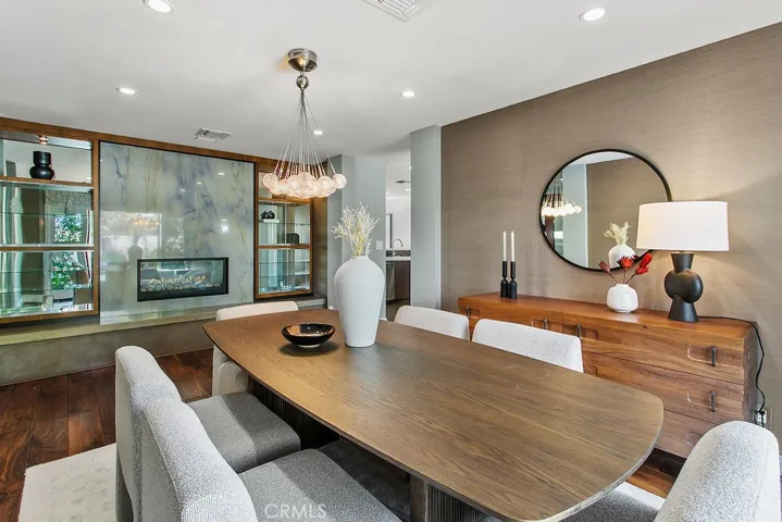 Formal dining room has fireplace too.