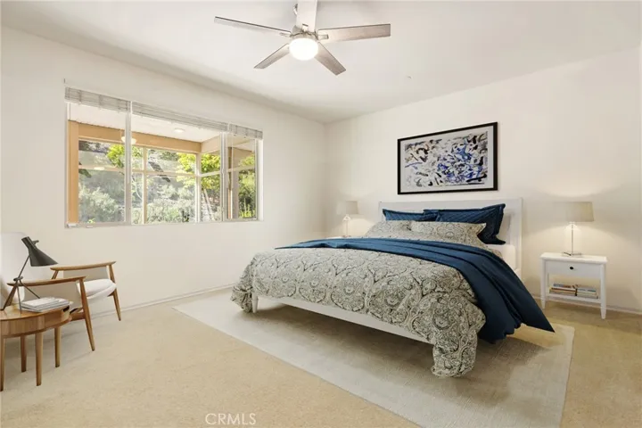 Primary bedroom. Virtually staged